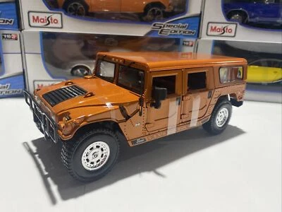 Hummer H1 Maisto 1:18 Scale Model Car Burnt Orange 10th Anniversary Edition  - Image 1 of 4