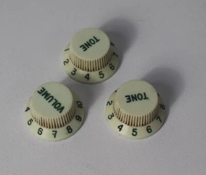 Aged Knobs Set For USA Strat - Parchment White with Green Font 3 Spokes - Picture 1 of 4