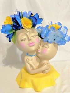 SILK FLOWER PLANTER HEADS. MOTHER & CHILD EMBRACING, BLUE, YELLOW & PINK FLOWERS - Picture 1 of 11