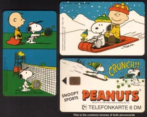 Tarjeta telefónica Peanuts Snoopy & Charlie Brown tenis nieve esquí trineo 2 diferentes - Imagen 1 de 1