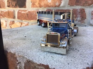 DCP 1/64 Peterbilt 379 36 Inch Sleeper Mac Spread Axle Dump Jake Transport - Picture 1 of 18