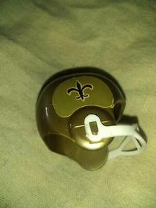 VINTAGE New Orleans Saints miniature gumball machine HELMETS. Still has stickers - Picture 1 of 4