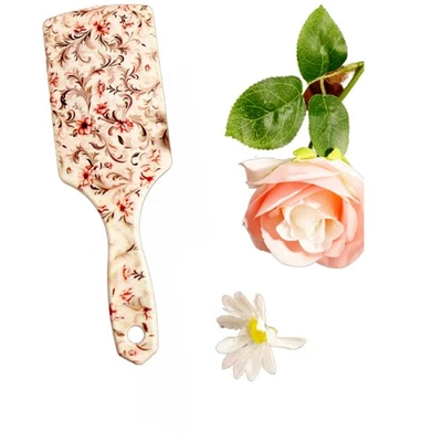 Cepillo de pelo con paleta floral - desenredante y alisante para mujeres, hombres, niñas y niños Foto 1 de 4