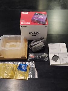 Canon Dc320 Silver Lcd Dvd Camcorder Digital Video Camera W/Inserts And Box