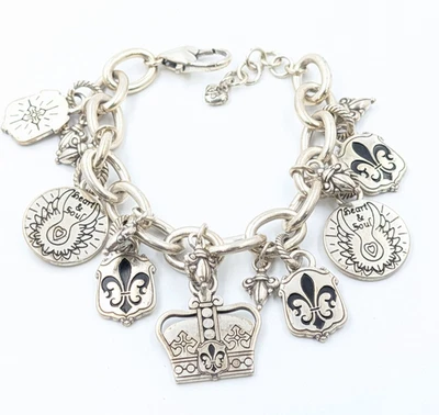 Pulsera BRIGHTON Corona Castillo y Flor De Lis Dijes Tono Plateado Se Ajusta a una Muñeca de 7"" Foto 1 de 4