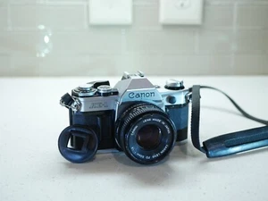 Canon AE-1 Film SLR 35mm Camera with Canon FD 50mm 1:1.8 Lens Tested Working - Photo 1/13