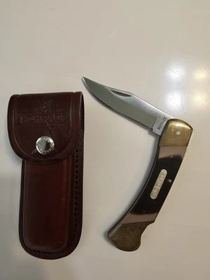 Navaja de bolsillo Schrade 70T plegable con bloqueo trasero con funda de cuero Foto 1 de 2