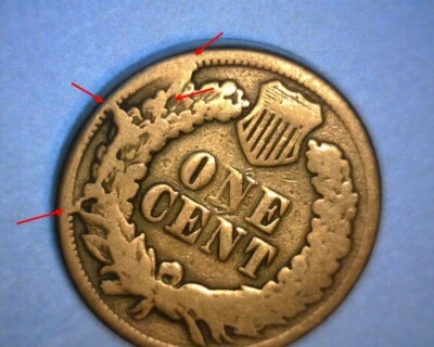 1863 INDIAN HEAD CENT🌟DIE BREAK,  REVERSE RETAINED CUD🌟"RARE"🌟US ERROR COIN - Image 1 of 4