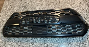 Genuine Toyota Genuine Toyota Tacoma TRD Pro Black Grille Insert PT228-35200 - Picture 1 of 13
