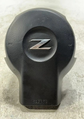 Оригинальная передняя левая водительская подушка безопасности на руль Nissan 350Z 2003–2009 годов выпуска - Изображение 1 из 4