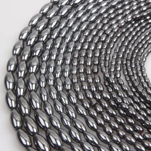 Cuentas ovaladas con forma de arroz de hematita negra natural de 4/6/8/10/12/16 mm para hacer joyas - Imagen 1 de 14