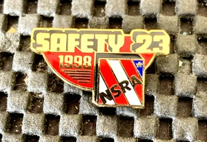 1978 NSRA SAFETY 23 VINTAGE COLLECTORS ENAMEL PIN AUTO RACING 1 1/8" X 5/8" NOS - Picture 1 of 2