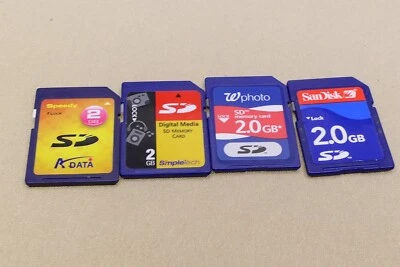 A set of four (4) used 2GB SD memory cards - Image 1 of 2