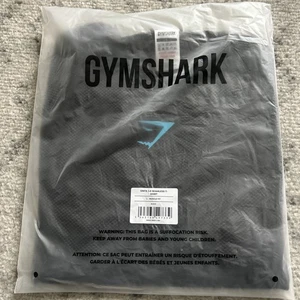 Camiseta sin costuras Gymshark Onyx 5.0 - negra/gris ónix azul en mano - Imagen 1 de 5