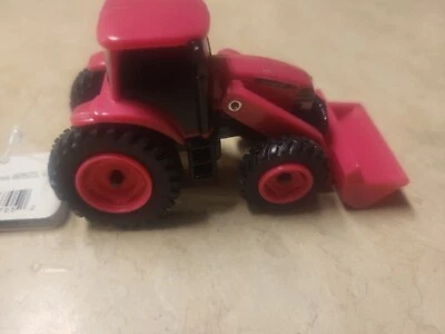1/64 ERTL Collect N Play Case IH Pink Tractor with Loader, ZFN46705 - Image 1 of 4