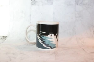 ¡Cambia de color! Taza de café sensible al calor Philadelphia Eagles Wings - Imagen 1 de 9