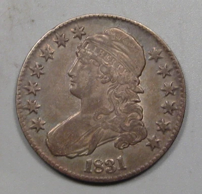 Medio dólar busto tapado plata 1831. Foto 1 de 4