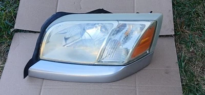 2006-2009 MITSUBISHI RAIDER DRIVER LEFT HEADLIGHT OEM. TESTED  READ FLAWS - Image 1 of 4