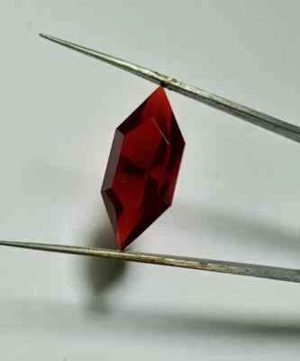 Pigeon Blood Red Corundum-Lab created Ruby  fancy Shape 28x12x12.10MM Fantasy Cu - Image 1 of 4