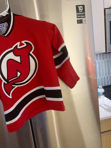 used New Jersey Devils red  ccm  hockey NHL jersey big toddler sz  child large Cover