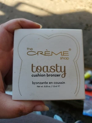 Bronceador The Creme Shop Toasty Cushion 1 tostado Foto 1 de 4