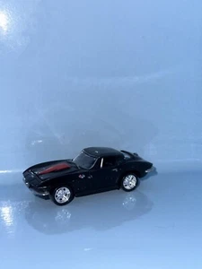Chevy Corvette Johnny Lightning 40 años 1966 negro ventana dividida suelta - Imagen 1 de 5
