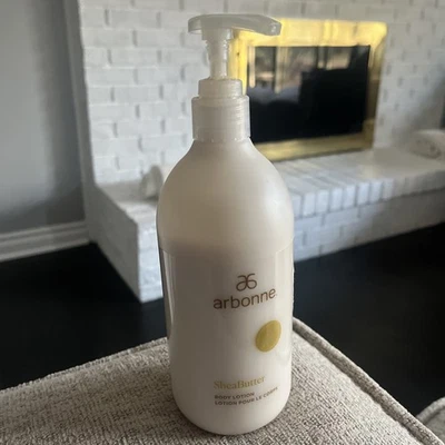 Loción corporal de manteca de karité ARBONNE 16 fl. oz.(100% VEGANO) 75% Completo Foto 1 de 2