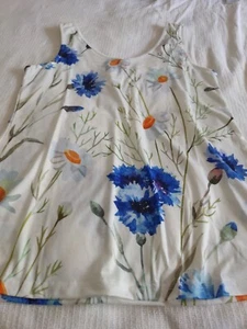 7 tops, brand new, in original packaging. Unable to return due to overseas. - Picture 1 of 14