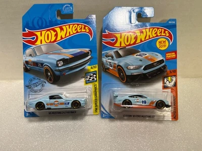 Hot Wheels '65 Ford Mustang and '18 GT in Gulf Colors **TWO MODELS** NEW ON CARD - Image 1 of 4