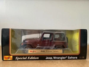 MAISTO JEEP WRANGLER SAHARA EN BOITE 1/18 F1 - Imagen 1 de 4
