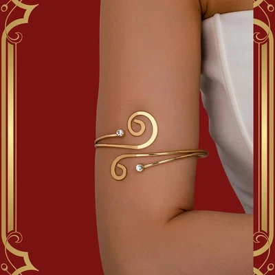 Brazalete superior espiral de oro amarillo de 10 quilates con diamante:... - Imagen 1 de 4