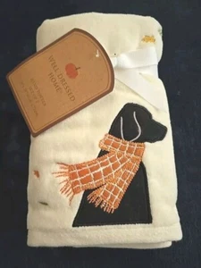 Well Dressed Home Black Lab With Scarf Blowing In Fall Leaves - Picture 1 of 6