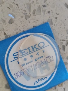 Original Seiko Crystal 305W12GM02 Seiko 6119-8550/855A/855B Glas NOS - Bild 1 von 3