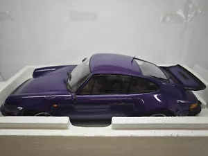 1:12 Minichamps Porsche 911 Turbo 1977 viola - Foto 1 di 4
