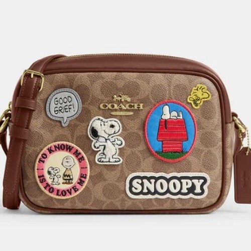 Borsa per fotocamera Coach X Peanuts Jamie in tela firmata con toppe CBM28