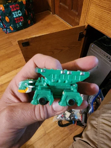 Dinotrux Scoot Dump Truck Green Die Cast Netflix Dinosaur Trucks 2016 Mattel Toy Cover