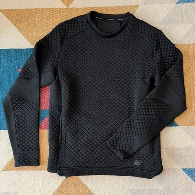 Suéter New Balance Hombre Mediano Negro, Bolsillos Frontales, Estilo Deportivo Foto 1 de 4