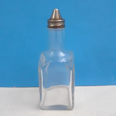Gemco EE. UU. Vinagre de Vidrio Transparente O Cruet de Aceite 6" de Alto, con Tapa de Acero Inoxidable. Foto 1 de 4