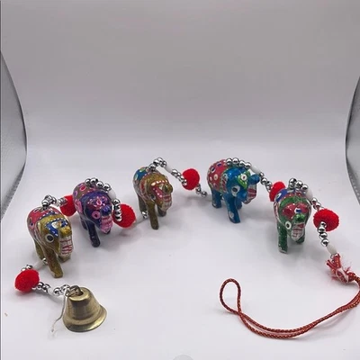 Juego de elefantes coloridos con campanas Foto 1 de 4