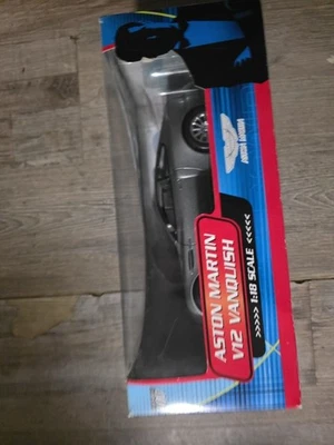 Aston Martin V12 Vanquish 007. 1:18 scale Die-cast. NIB #10011. James bond 007 - Image 1 of 4