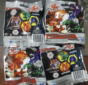 Set of 4 Bakugan Mystery Figure Blind Bags Mystery Minifigs New - Picture 1 of 1