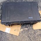 Pelican 1650 black wheeled hard case w/ holes drilled for power supplies