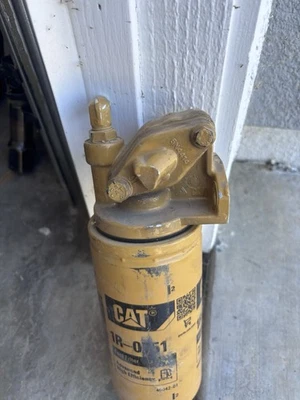 Base de filtro de combustible Cat 4770/24770 para motores diésel 1R-0749 1R-0750 Foto 1 de 4