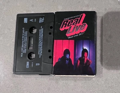 Real Live ‎Real Live Sh-t Audio Cassette Tape Single 1995 K-Def Larry O - Image 1 of 2