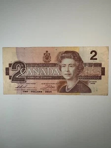 Billete de dos dólares Thiessen/Cuervo de Canadá 1986 - Imagen 1 de 2