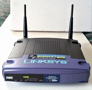 Linksys WRT54G 4-Port 10/100 Wireless-G Router + SURFboard SBG900 Cable Modem - Afbeelding 1 van 4