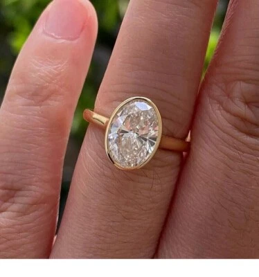 Anel de noivado 3 CTW corte oval lMoissanite solitário folheado a ouro amarelo 14k - Imagem 1 de 4