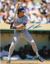 JOSE CANSECO  TEXAS RANGERS    ACTION SIGNED 8x10