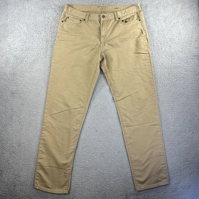 Pantalones de mezclilla Banana Republic de viaje para hombre 36x34 color caqui tostado calce ajustado elásticos Foto 1 de 4