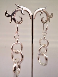 1AR UNOAERRE ORECCHINI DONNA OTTONE PENDENTI COLOR ARGENTO CERCHI CONCATENATI - Foto 1 di 1